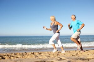 older-couple-fitness-beach